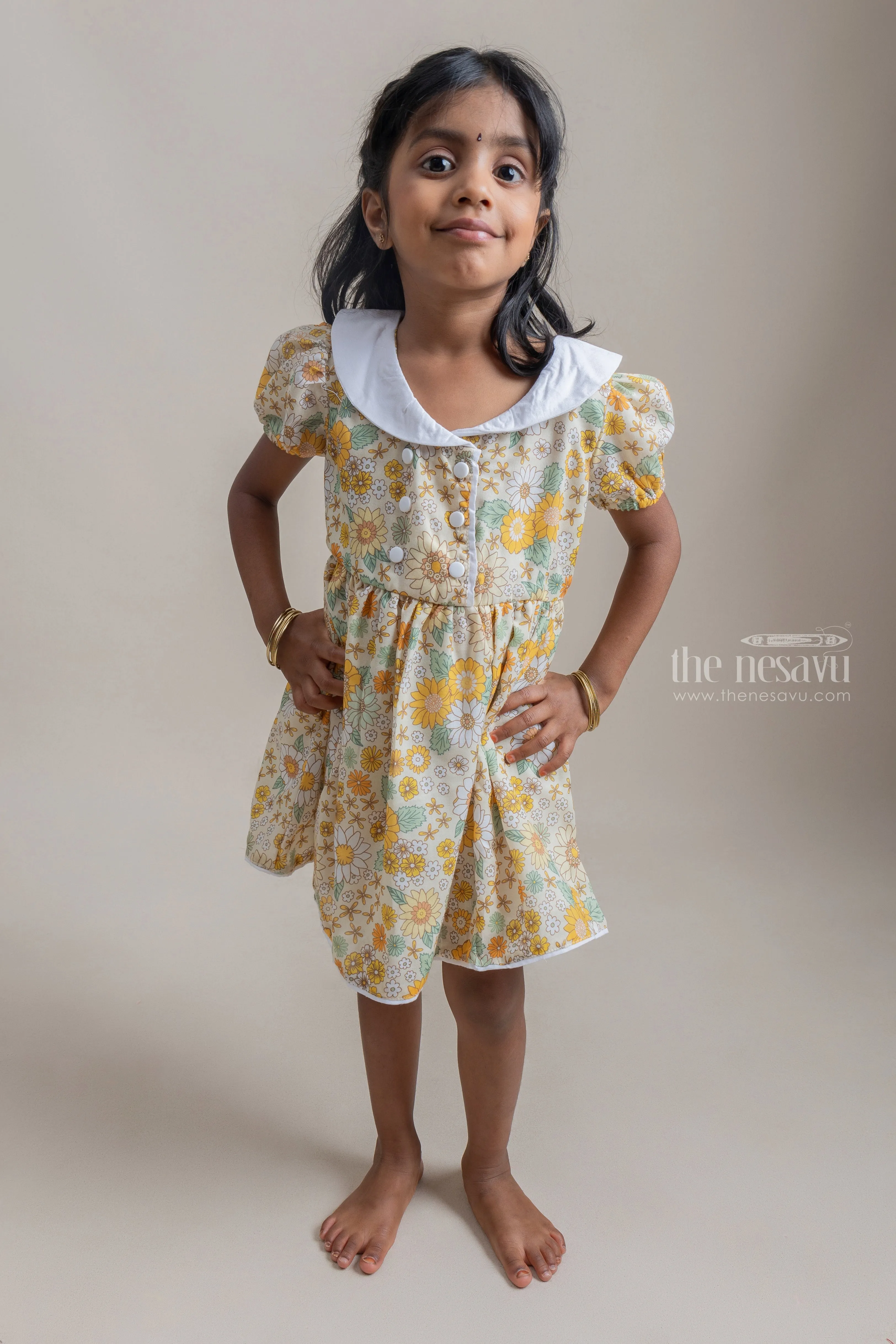 Fancy Yellow Floral Printed Button Closure Daily Wear Cotton Frock For Girls