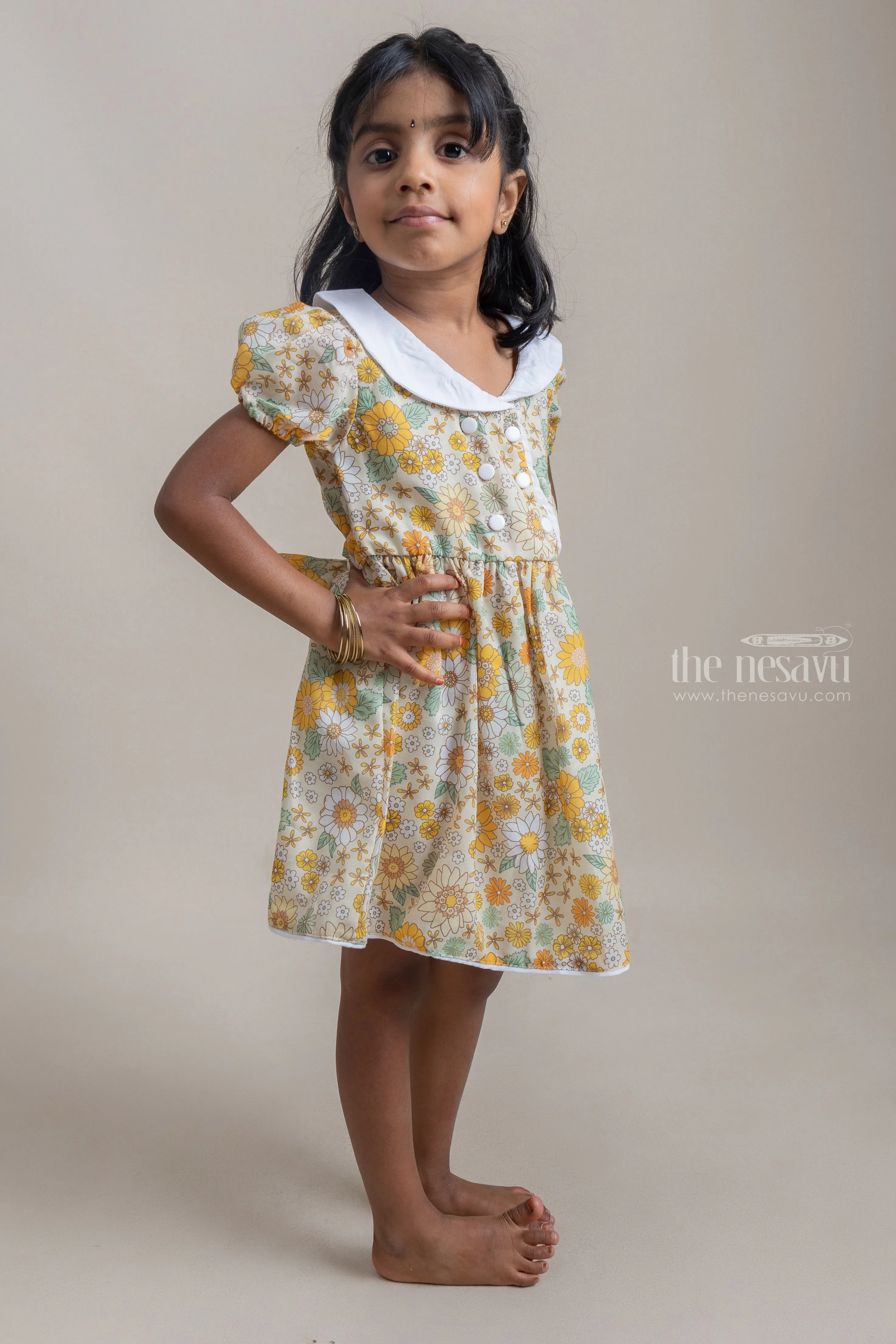 Fancy Yellow Floral Printed Button Closure Daily Wear Cotton Frock For Girls